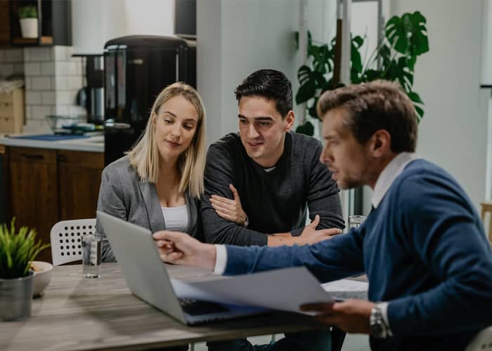 The Lozoya Law team in consultation with a client